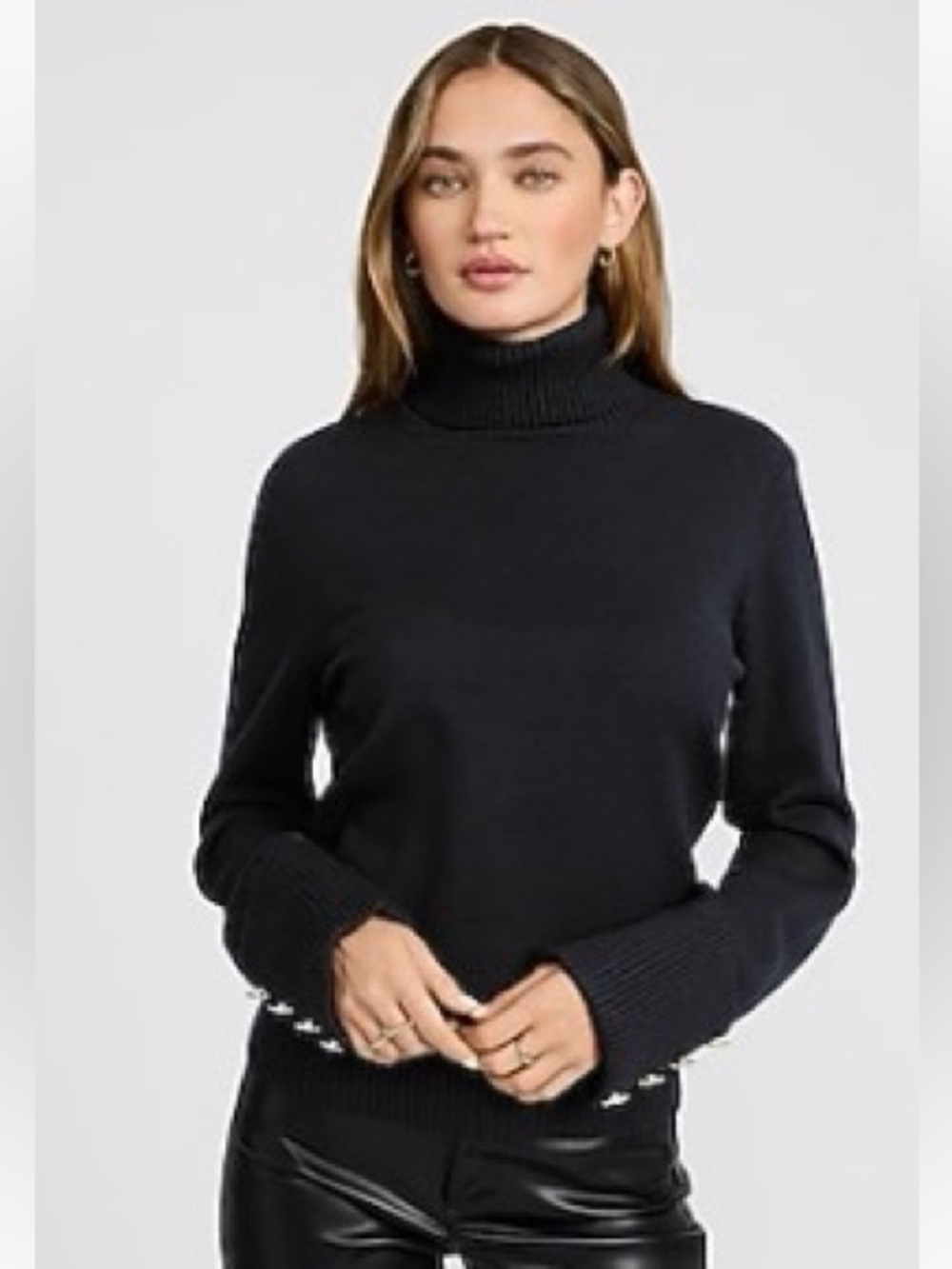Express black turtleneck adorned with 4 gold buttons on end of sleeves S